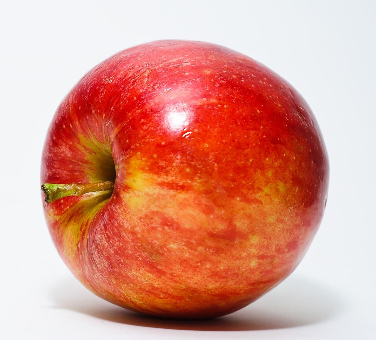 Original full-colour photograph of a red apple